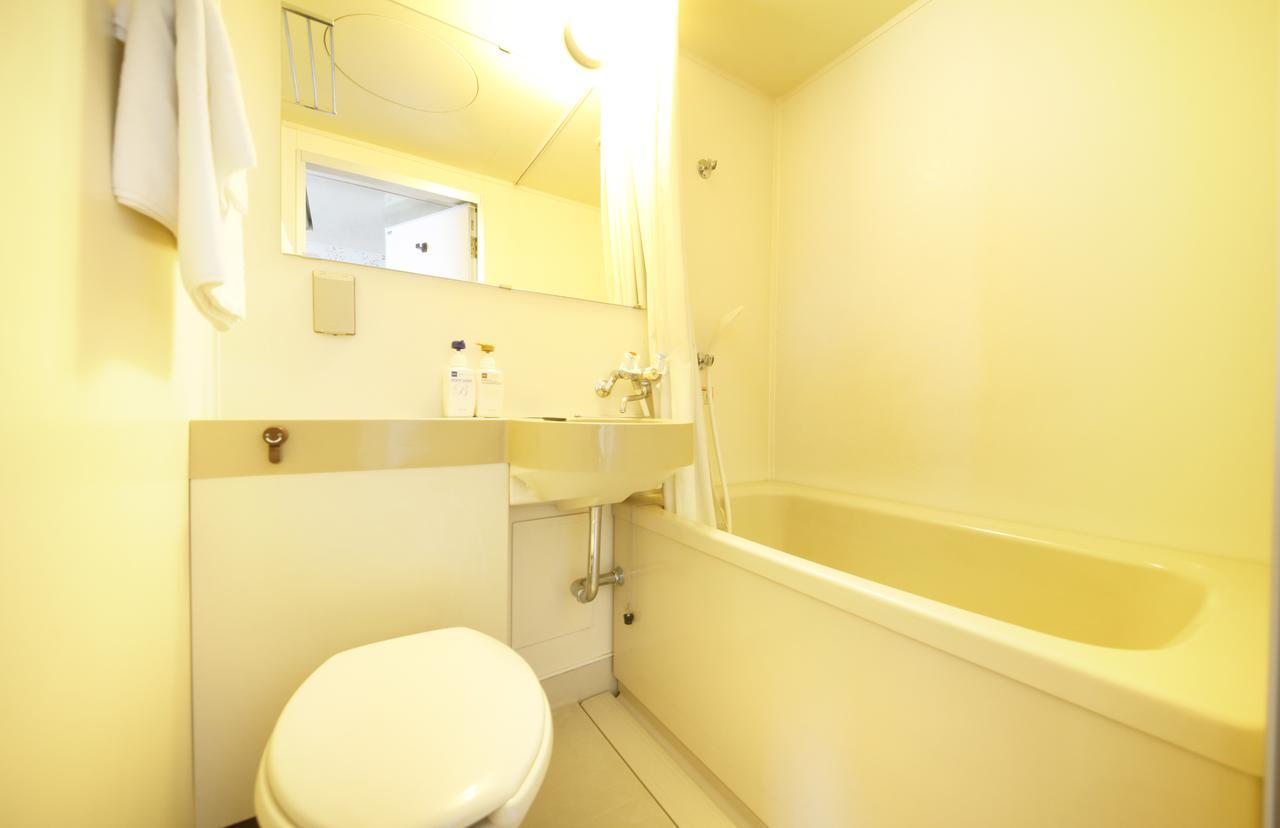 Business Hotel Taihei Annex Macujama Pokoj fotografie
